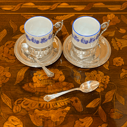 Pair of Porcelain Coffee Cups with Silver Saucers