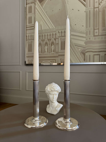 Pair of sterling silver candlesticks with grooved stem