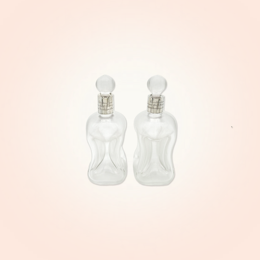 Pair of "Kluk-kluk" Ribbed Glass Decanters