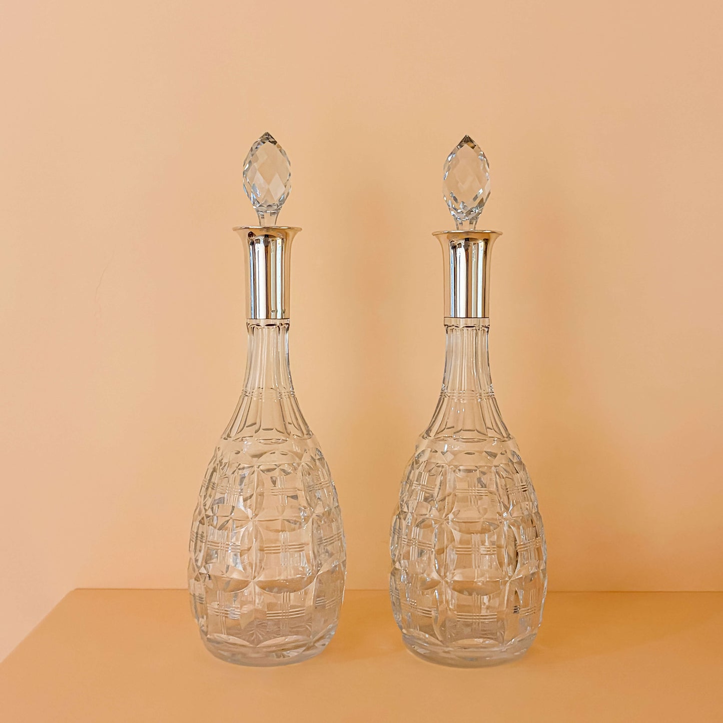 Pair of Cut Glass Bottles with Sterling Silver Mounts
