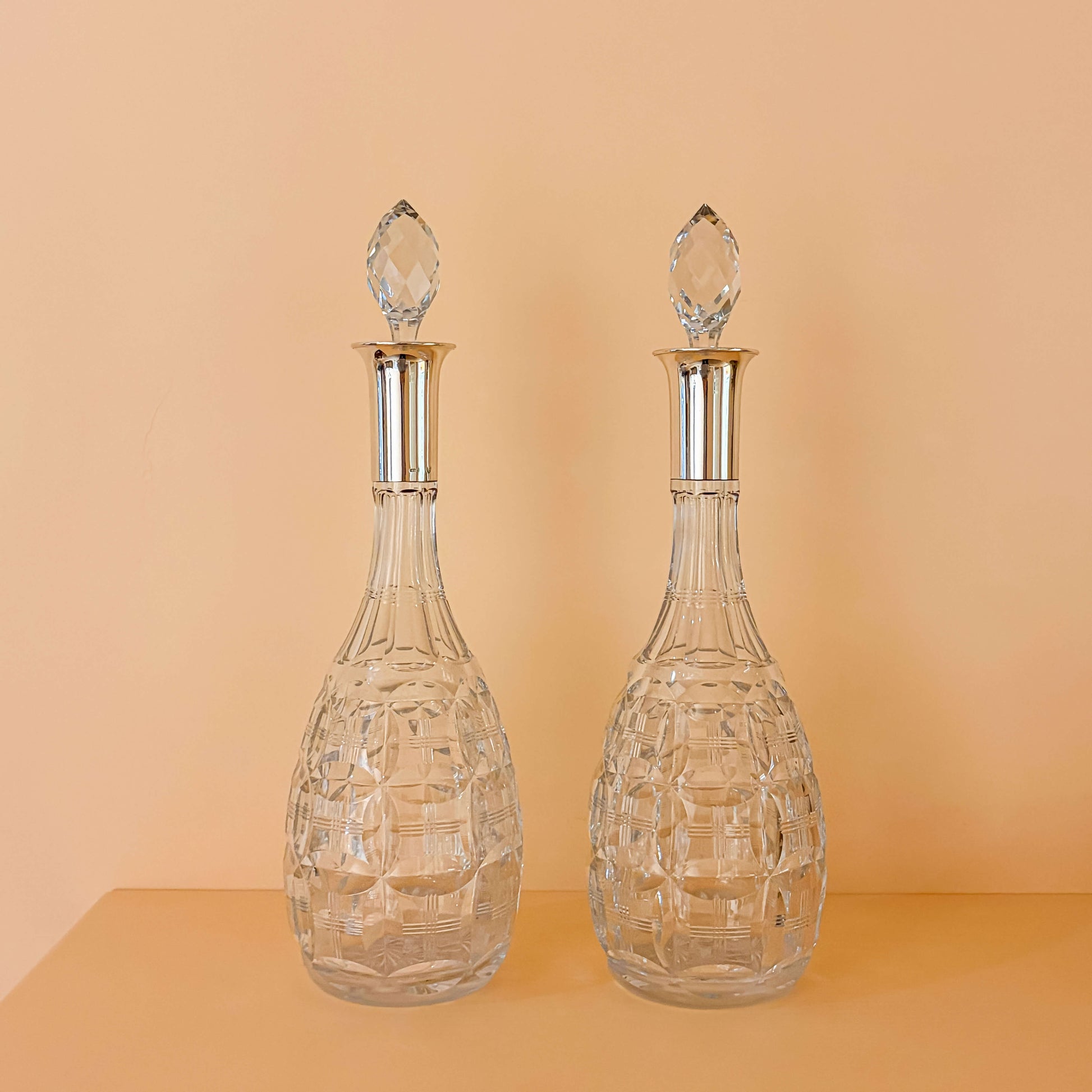 Pair of Cut Glass Bottles with Sterling Silver Mounts