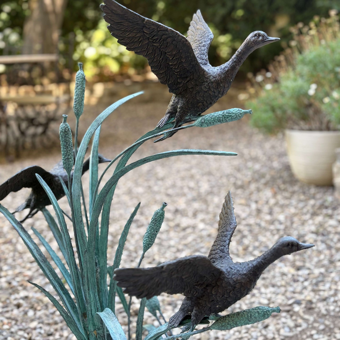 Patinated Bronze Ducks Statue