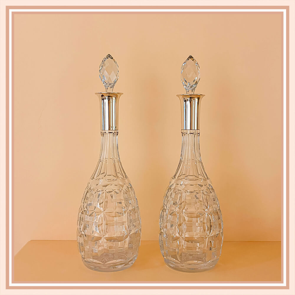 Pair of Cut Glass Bottles with Sterling Silver Mounts