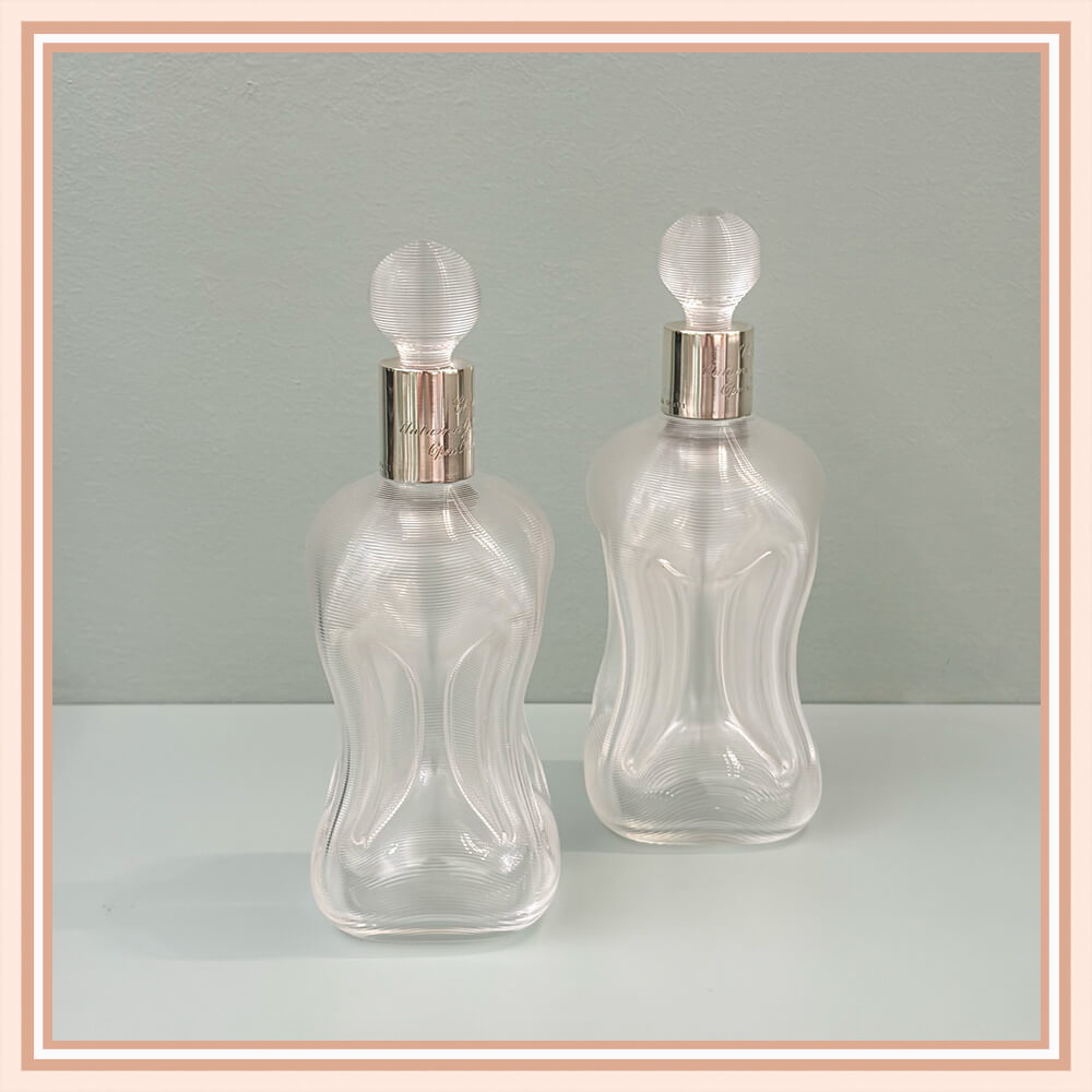Pair of "Kluk-kluk" Ribbed Glass Decanters